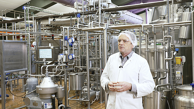 Man next to FOSS machine