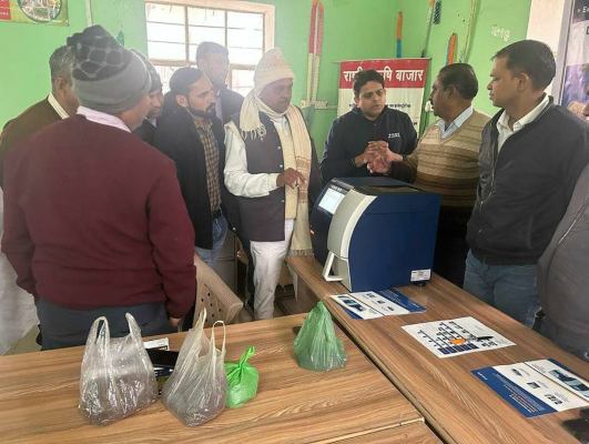 People next to foss instrument